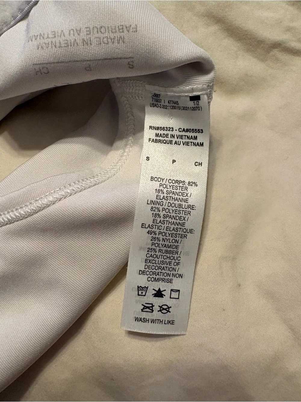 Nike White Racerback Sports Bra with Black Swoosh